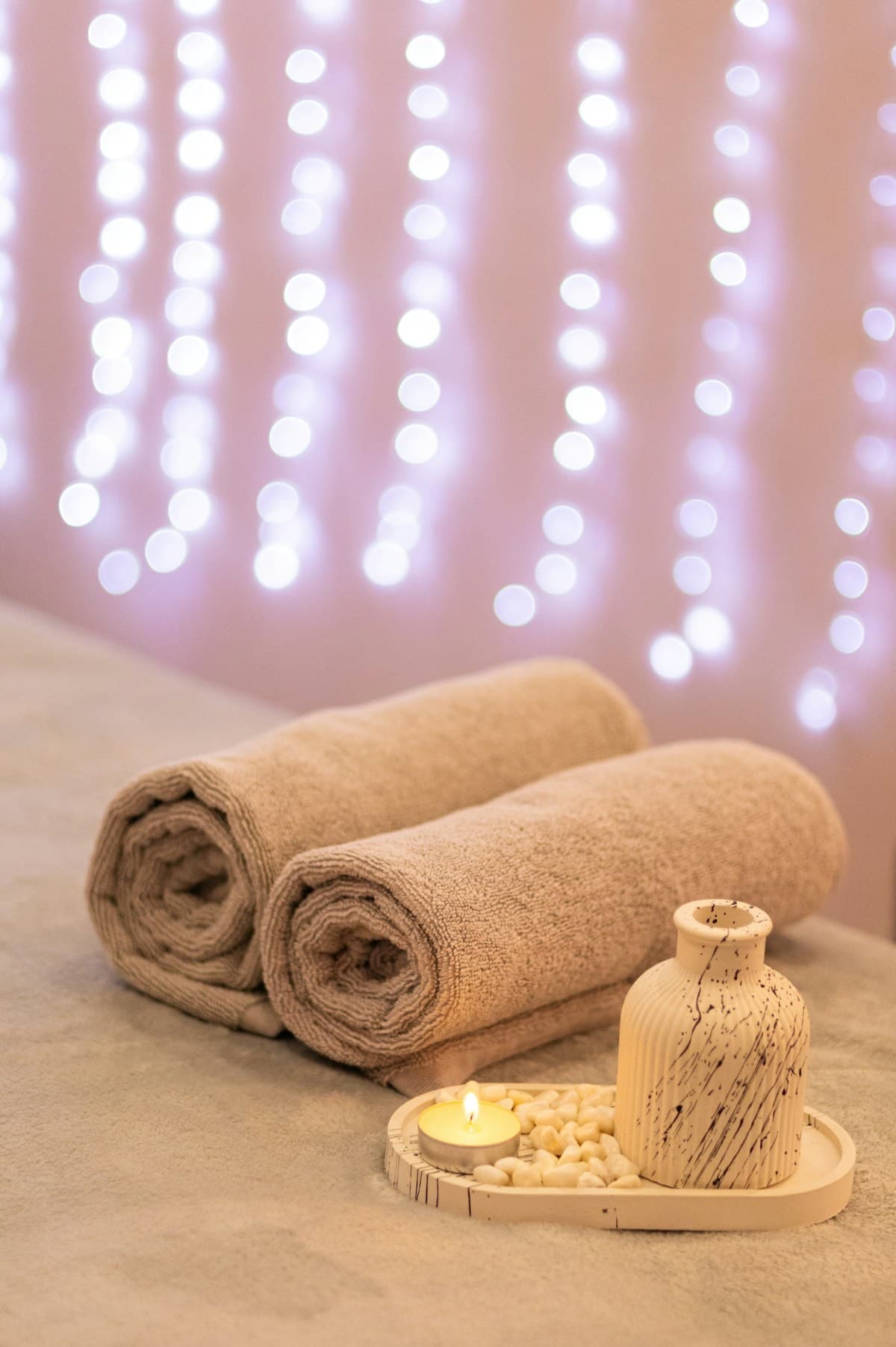 Handtücher und Kerzenlicht als Geschenkidee